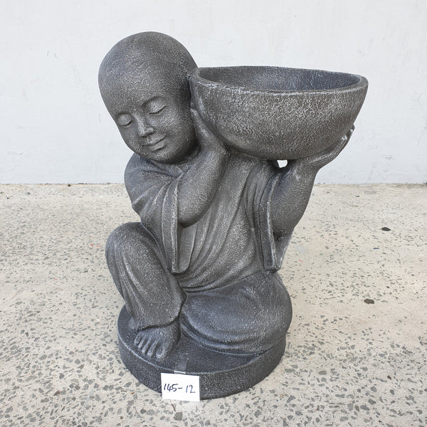 Fibre Cement Monk Holding Up A Bowl at World Of Decor NZ